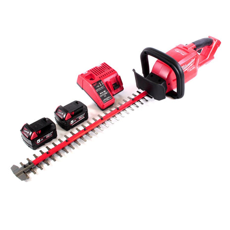 Cortasetos a batería Milwaukee M18 CHT-502C 18 V 610 mm sin escobillas + 2x baterías 5,0 Ah + cargador